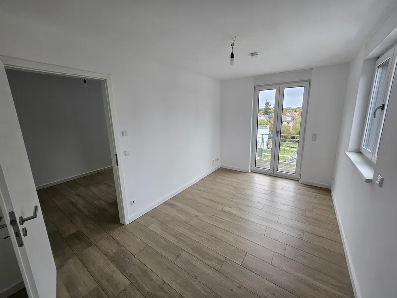 Neubau 2022 mit 2 Zi Whg. mit Balkon, Lift + Einbauküche — photo 1